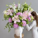 Lyrical Beauty flower arrangement in a vase
