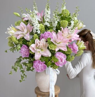 Lyrical Beauty flower arrangement in a vase