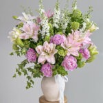 Lyrical Beauty flower arrangement in a vase