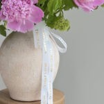 Lyrical Beauty flower arrangement in a vase