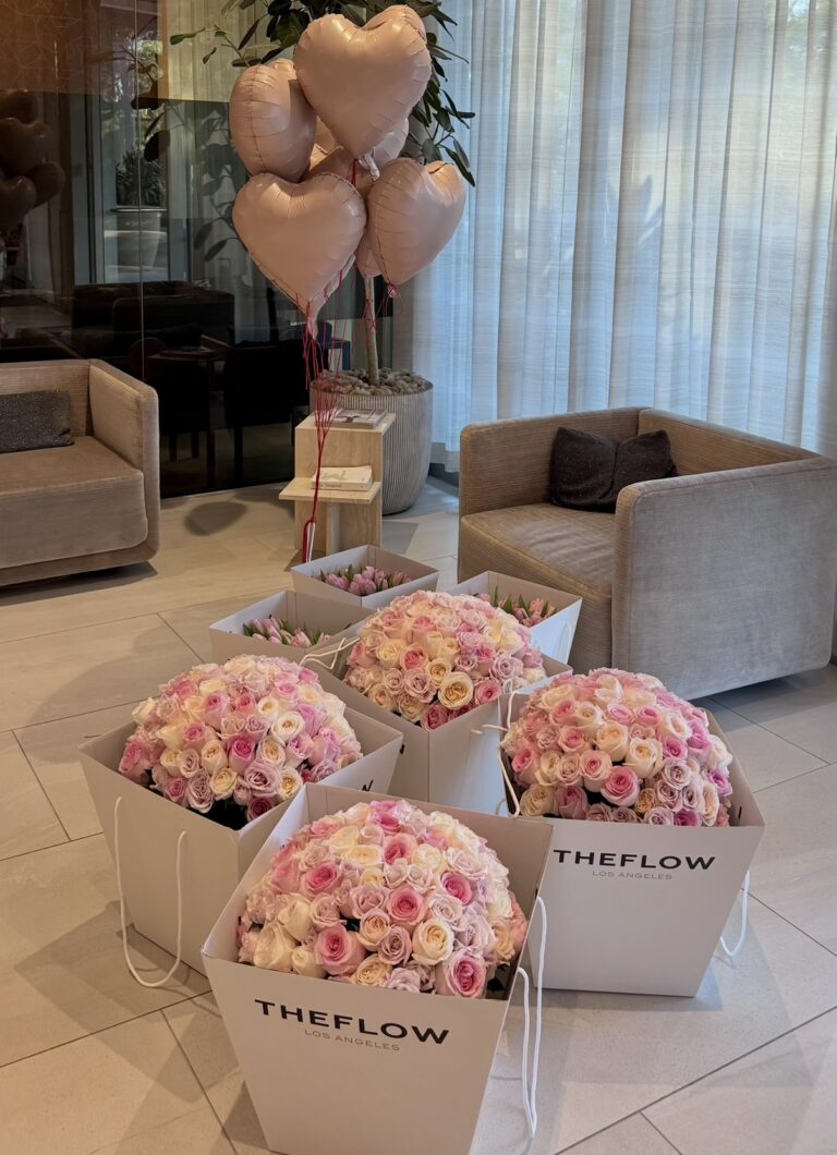 THEFLOW bouquets of pink and cream roses in branded boxes, ready for delivery