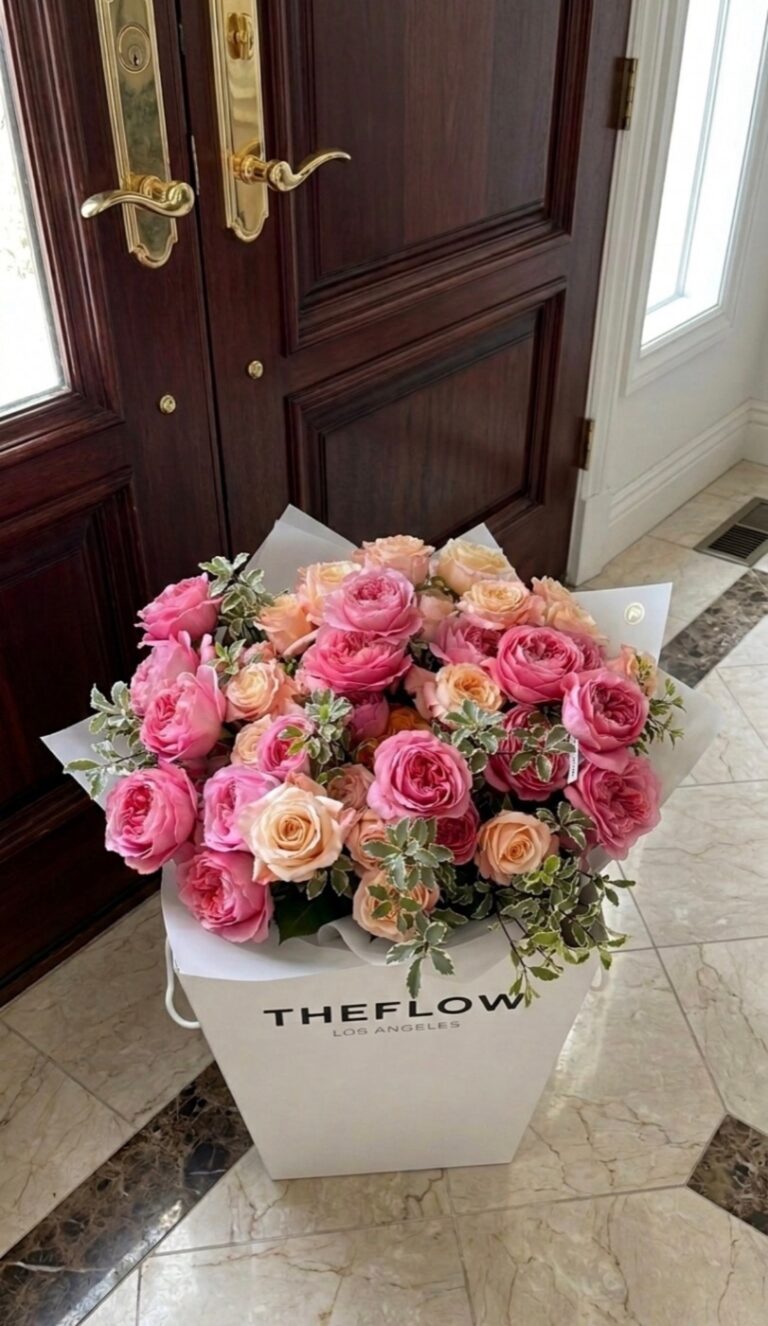 TheFlow box with roses delivered to a front door